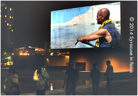 Urban Video Project screened Western Union: Small Boats by Issac Julien in Everson Plaza