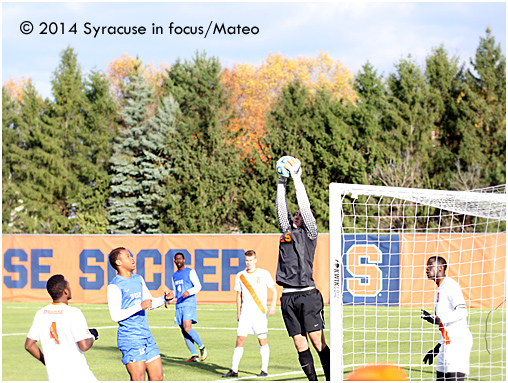 Keeper: Syracuse University's Alex Bono (from Baldwinsville) skies to defend the goal in the second half.