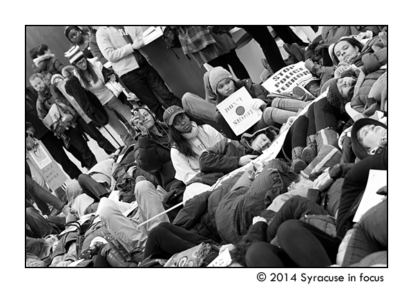 Activists staged a die-in at Bird Library earlier this evening.