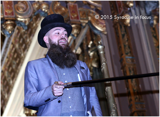 Syracuse's favorite impersario Mike Heagerty preps the judges. He is wearing an extension, or a beard weave or chin toupe crafted by Shannon Flemming.