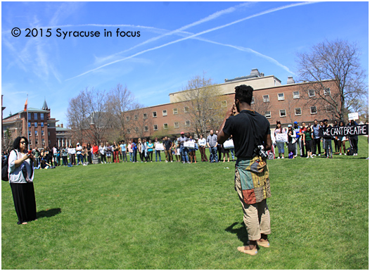 Journalist Sherri Williams (left) takes a video of Colton Jones during today's General Body demonstration (at Syracuse University).