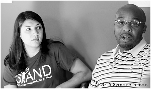 Journalist Ashley Kang (left) listens to Quante Wright during today's Talk Back session at the Southside Communications Center.