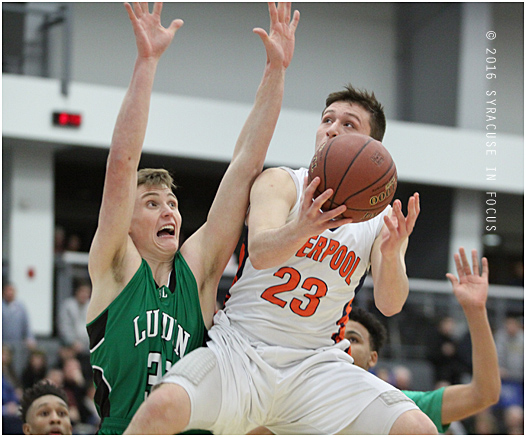 Tyler Sullivan of Liverpool was injured early in the first quarter of the Section III (Class AA) final yesterday. Bishop Ludden beat Liverpool 49-37.