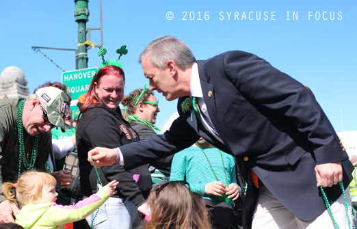 Rep. John Katko handed out beads at the St. Patrick's Day Parade in the home district on Saturday