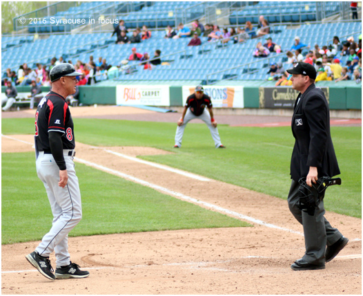 Mike Quade argues his case for a second run after the play at the plate.