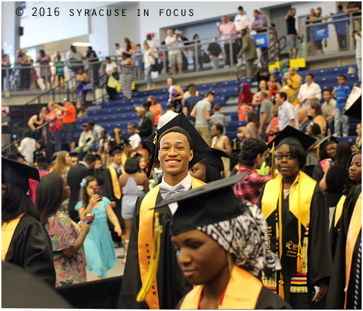 Henninger High Senior Taj Mitchell marches into SRC Arena with the Class of 2016.