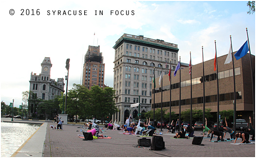 The sunrise Metrofit Yoga program drew a generous crowd to Clinton Square this morning.