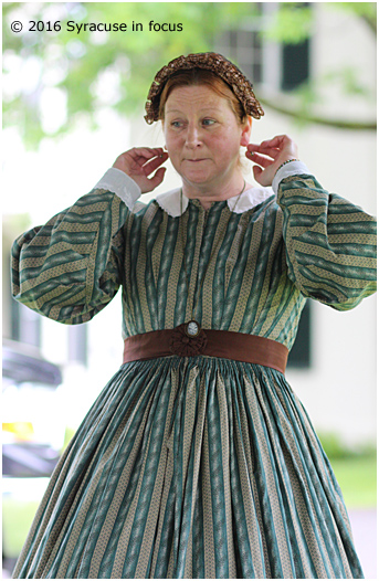 History and fashion expert Laini Amaritnant talked about ear bobs and bishop sleeves she was wearing during a vintage fashion show for the 24th Annual Peterboro Civil War Weekend on Saturday.