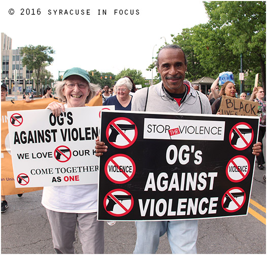 Activists Aggie Lane and Cliff Ryan marched during Black Lives Matter protest on Monday.