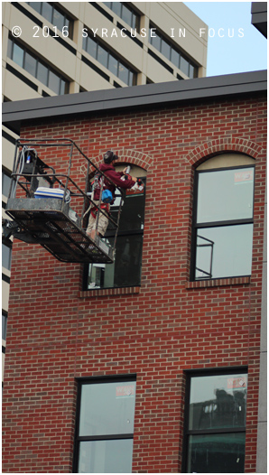 Finishing touches put on the addition to The Amos Building (Clinton Square)