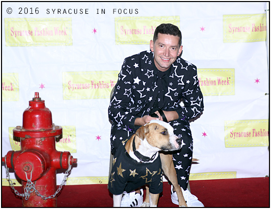 Sarge the 2-year old pit bull mix and Justin the Sartorialist were show stoppers at the Syracuse Fashion Week Dressed to the K-9s runway show.