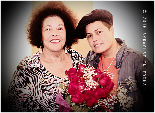 Poets Jackie Warren Moore (left) and Jas pose for a photo after a book release/poetry ready by Moore at Art Rage Gallery this evening.