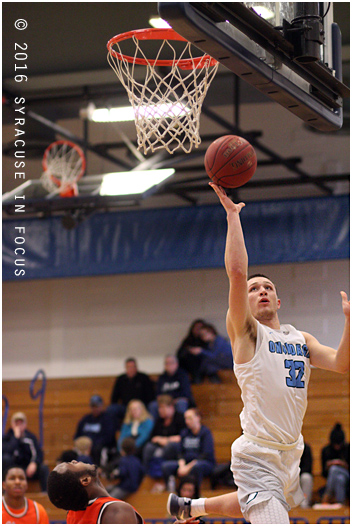 Tyler Sullivan (the baller) takes it to the hole for two in the second half of today's game at OCC.