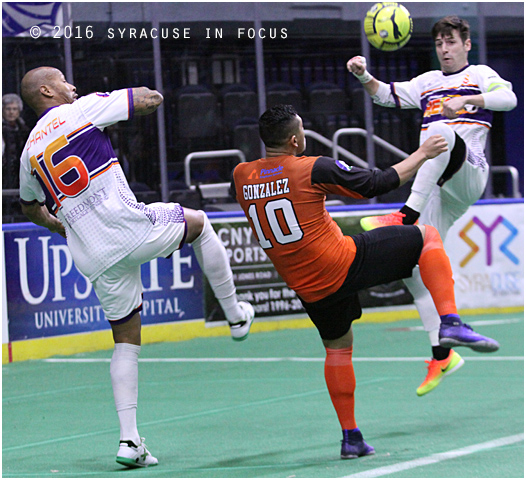 Moises Gonzalez (center) fights for position in the first half of last night's game against Harrisburg.