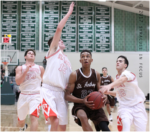 Bishop Ludden guard Mika Adams-Woods drives for a layup during the third quarter of yesterday's Zebra Classic matchup with CBA. He finished with 21 points.