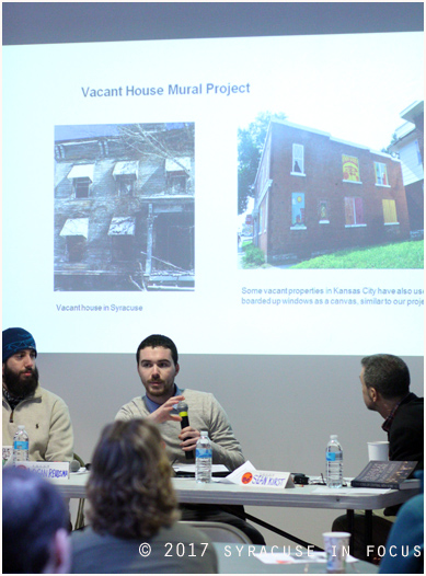 Liam Kirst of the Land Bank talked about a new mural program that will be applied to abandoned and dilapidated homes in the city. He was a guest, along with his father and Logan Reidsma, at the F.O.C.U.S. Forum.