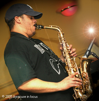 Sam Kinninger, blowing the roof of somewhere in Hanover Square (circa 2006).