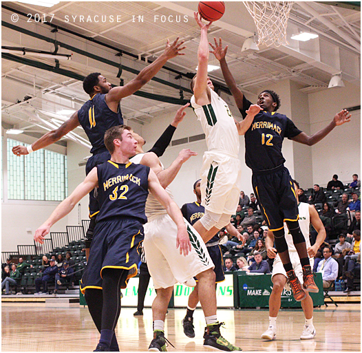 Stan the Man: Stan Buczek tips in one of his 17 points against Merrimack College. Lemoyne lost to Merrimack in the Regional Quarterfinals 72-68. Bucez also hit a key three pointer to send the game to overtime. He finished the game with 12 rebounds as well.