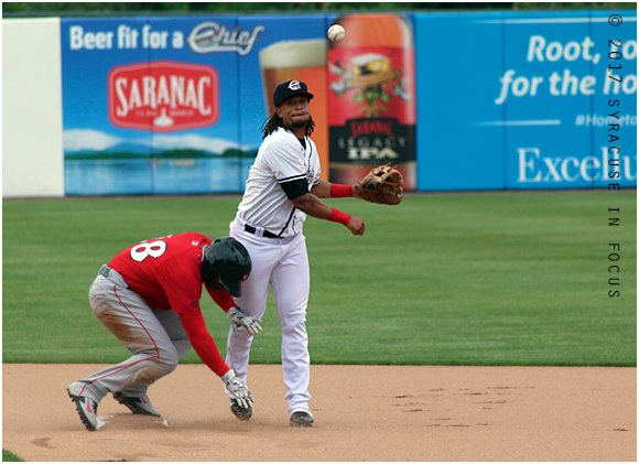 Emmanuel Burriss was active on his return to NBT Bank Stadium for the Chiefs. He led off the line up and played second base. Here he assists in a force out at second base in the top of the first inning.