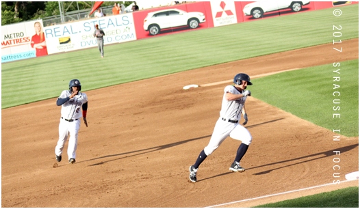 In the first inning of Wednesday's game Andrew Stevenson (right) and Irving Falu were so close on the base paths that they could probably hear each other breath. They were both anxious to score, but Falu got called out at home. Nonetheless, the Chiefs scored 4 runs in the first and eventually won the game 10-6 after being shut out on Independence Day.