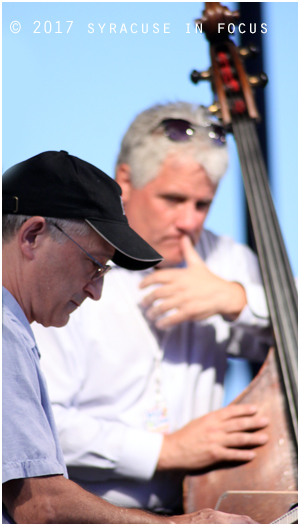 Jim Colemon watches on as Bobby Jones pounds away on the keys. They were part of the Bobby Militello Quartet.