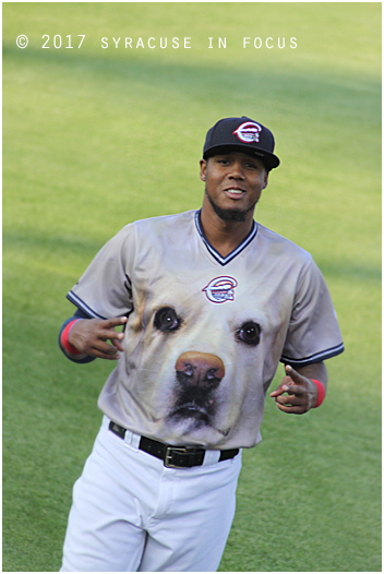 Even wearing a uniform with a dog face, third baseman Michael Almanzar still has style.