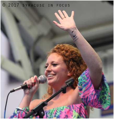 Marissa Mulder told a crowd in Armory Square about a tattoo she has that reads "It's a Barnum and Bailey world."