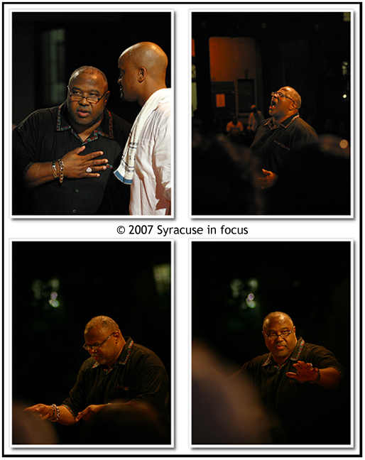 August 26--Gospel Weekend--Pastor J. Alfred Cages directs the New York State Fair Gospel Choir last night. He confers with guest conductor Jason Barnes (upper left) before the first song.